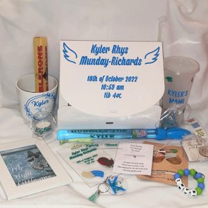 Hearts for Hudson comfort package with personalised keepsakes, plant pot, cold cup, and memorial plaque.